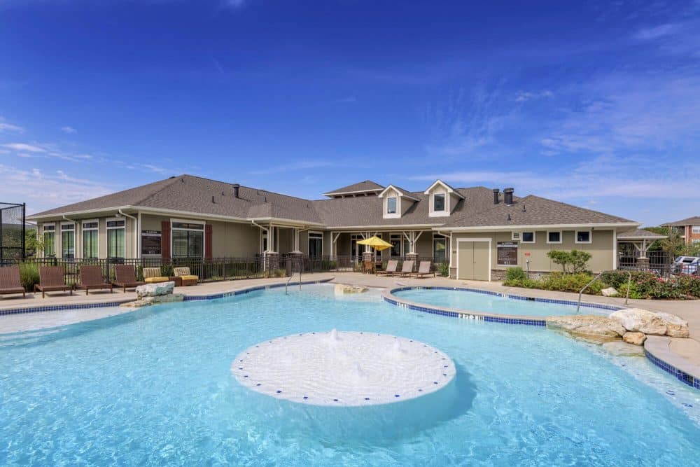 arba san marcos off campus apartments near texas state university california style pool resident clubhouse exterior